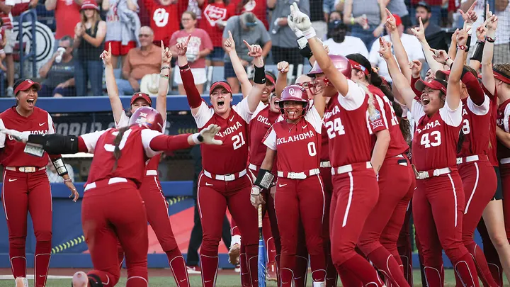 Players of the Oklahoma Sooners react to Grace Lyons #3 of the Oklahoma Sooners getting a home run against the Florida State Seminoles during the Division I Women's Softball Championship held at USA Softball Hall of Fame Stadium on June 8, 2023 in Oklahoma City, Oklahoma. (Tyler Schank/NCAA Photos via Getty Images)